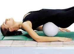 Exercise with a pillow under the kidneys
